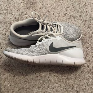 Grey and white Nike running shoes. Size 7